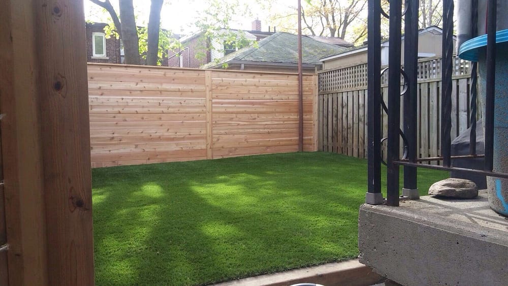 New fencing with grass looks clean and natural