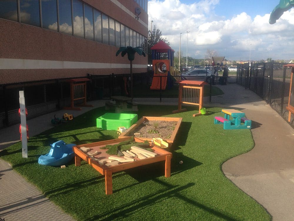 Artificial grass playground installation Mississauga daycare center