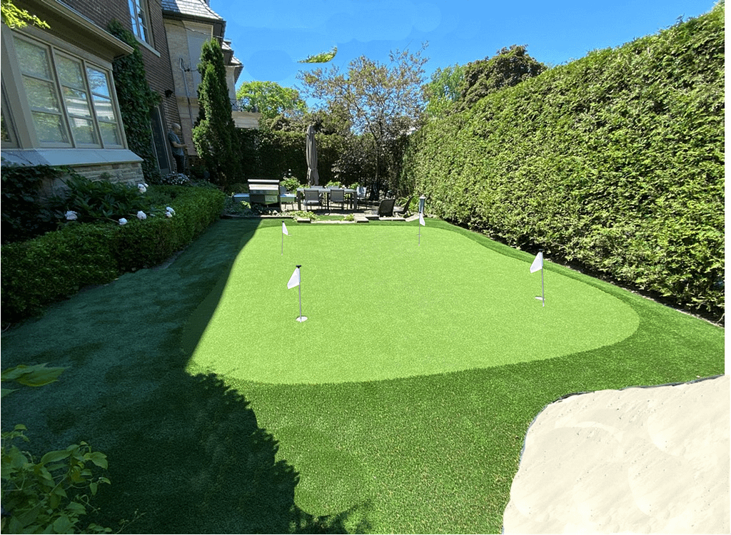 Lovely 4-hole synthetic golf green and fringe turf and sand trap