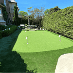 Lovely 4-hole synthetic golf green and fringe turf and sand trap