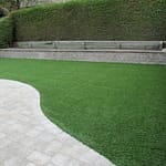 Splendid use of landscape grass with well planned walls and pavers