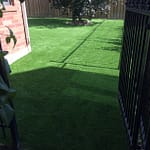 Nice entrance using artificial grass into the backyard
