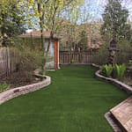Curves look good but difficult to mow, artificial grass is the answer