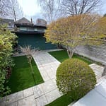 Alovely match of stone path and artificial grass