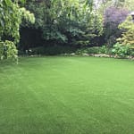 artificial-gras-large-yard-with-gardens