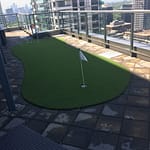 2-hole artificial golf green on balcony.-