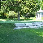 green with large Armour rock retaining stones