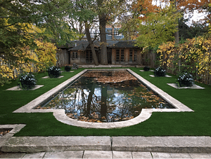Luxurious artificial grass before jumping in the pool 