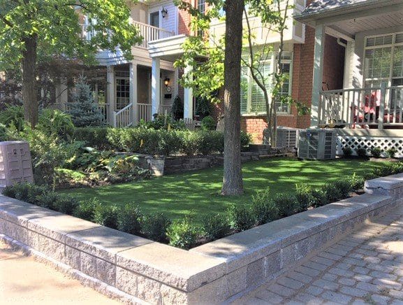 Retaining wall boxwood hedging artificial grass