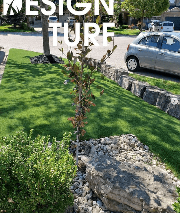Nice front yard landscape with artificial grass